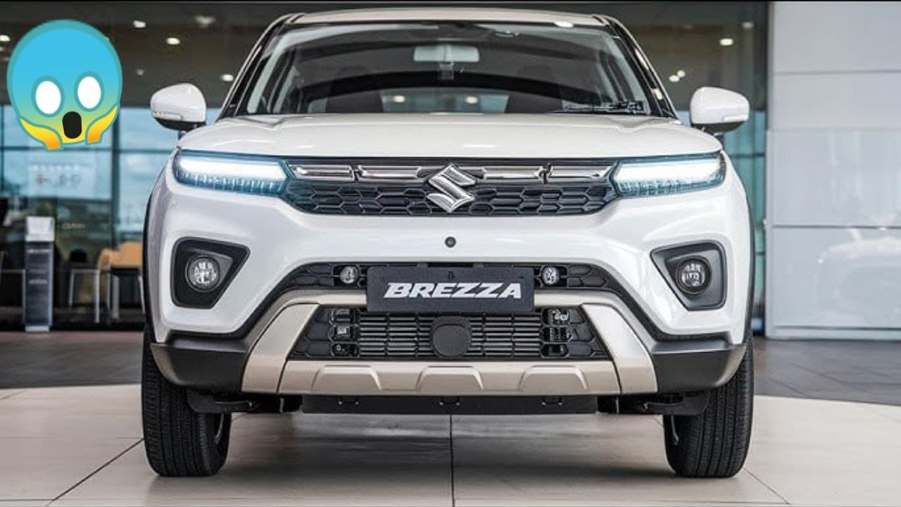 maruti-brezza-lxi-2025-front-side-look maruti-brezza-lxi-2025-front-side-look